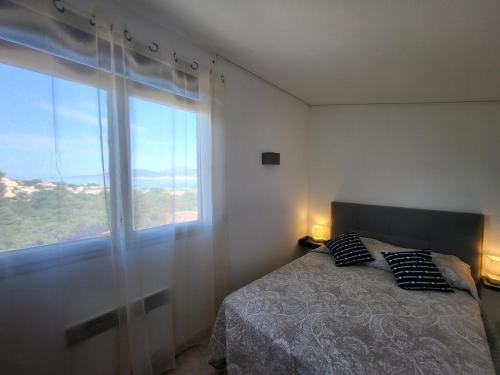 Postel nebo postele na pokoji v ubytování PORTICCIO villa dans résidence avec piscines 4-6 personnes BRILOC Appartements
