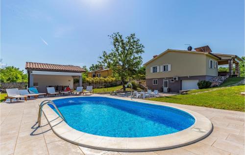 Stunning Home In Marceljani With Outdoor Swimming Pool, Wifi And Heated Swimming Pool