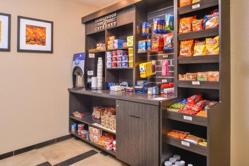 a food section of a grocery store with a counter at Candlewood Suites Beaumont by IHG in Beaumont