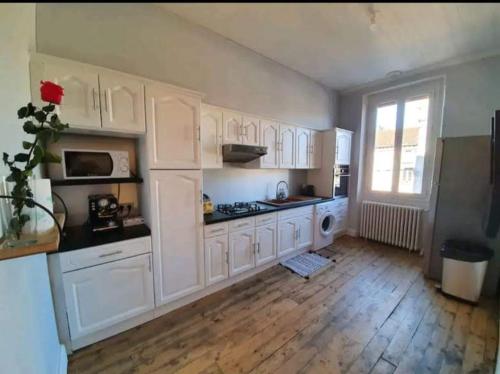 Kuchyň nebo kuchyňský kout v ubytování Spacieux Cosy