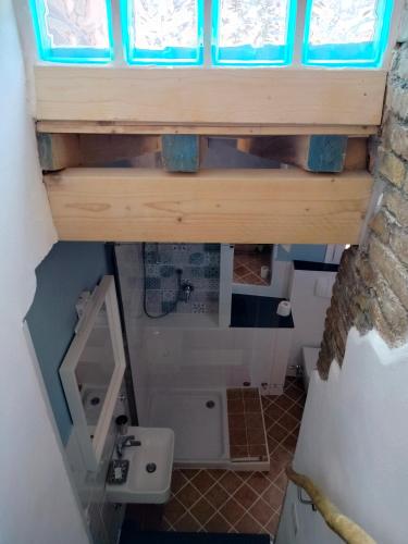 Μια τηλεόραση ή/και κέντρο ψυχαγωγίας στο Attico romantico con terrazza Sanremo - Palm Street, 104 - Free WIFI