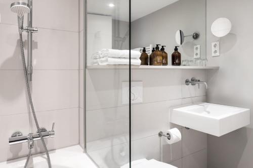 Hotel AMANO Rooms & Apartmentsにあるバスルーム