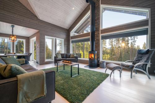 A seating area at Vakantiehuis met geweldig uitzicht en hottub