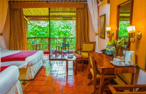 Voodi või voodid majutusasutuse Paraa Safari Lodge toas