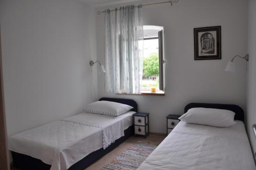 Un pat sau paturi într-o cameră la Apartment Sweet Home