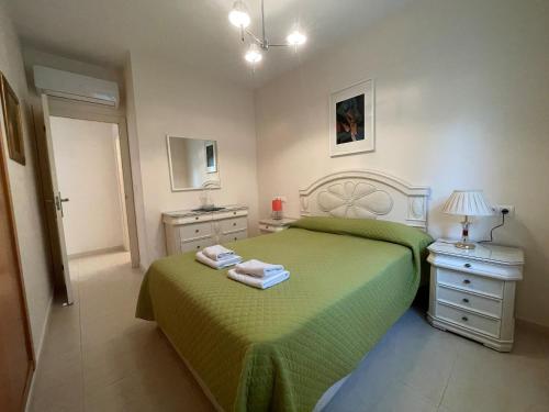 A bed or beds in a room at Green I