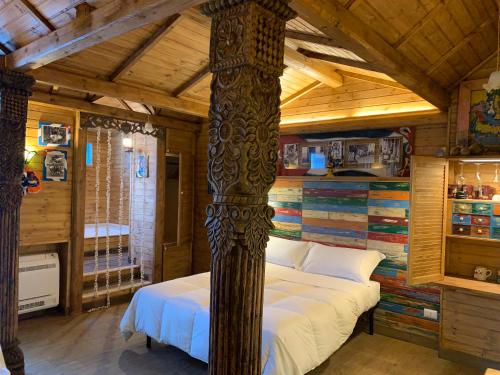 Postel nebo postele na pokoji v ubytování La Casa di Emanuella - Rooms & International Suites