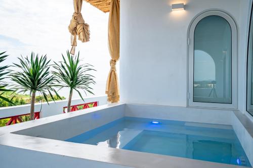 a swimming pool in the middle of a house at Happiness Hotel in Quy Nhon