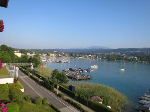 a view of a river with boats in the water at Chalet Reserl by Interhome in Lichtpold