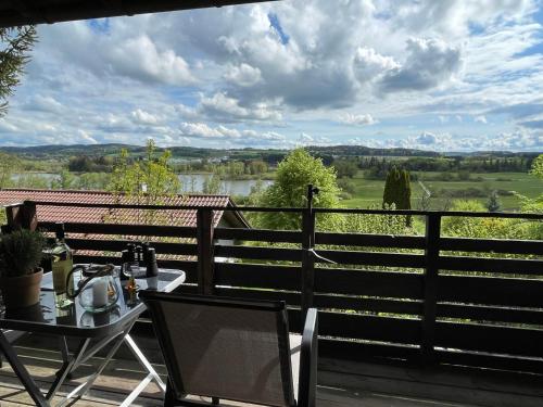 a table and chairs on a balcony with a view at Holiday Home Alpenblick by Interhome in Pfrungen