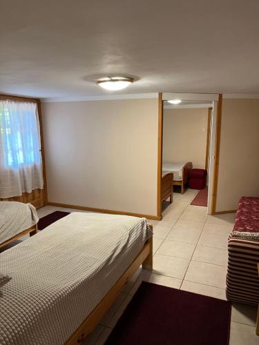 Ένα ή περισσότερα κρεβάτια σε δωμάτιο στο Apartment Willa Teresa by Interhome