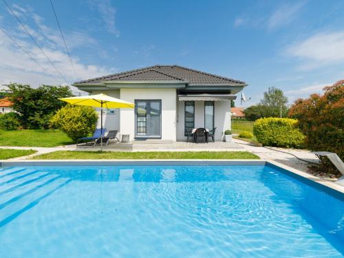 The swimming pool at or close to Holiday Home Geminis by Interhome