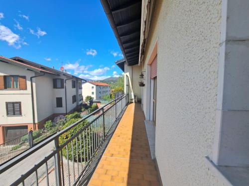 a balcony with a view of a building at Holiday Home Bonny by Interhome in Luino