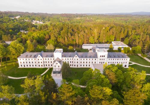 an aerial view of a large white building at Iberik Gran Balneario de Guitiriz in Guitiriz