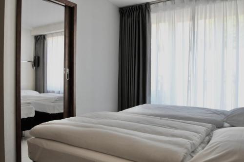 Postelja oz. postelje v sobi nastanitve Super Stay Hotel, Oslo