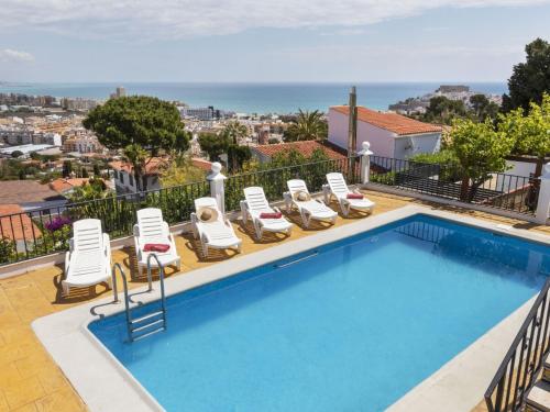 Utsikt över poolen vid Holiday Home Villa Cuba by Interhome eller i närheten