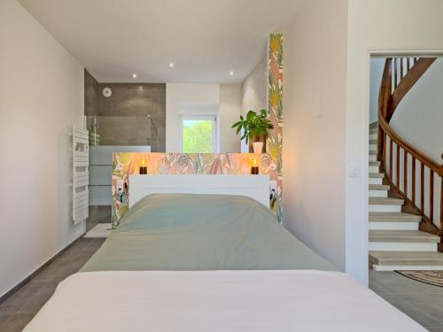 Ένα ή περισσότερα κρεβάτια σε δωμάτιο στο Holiday Home Ker Yannick by Interhome
