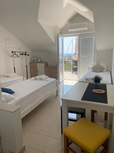 Photo de la galerie de l'établissement Studio apartmani Alex, à Novalja