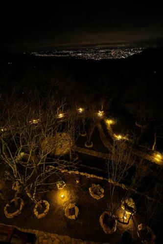 an aerial view of a park at night with lights at Villa Vejini in Mamkoda