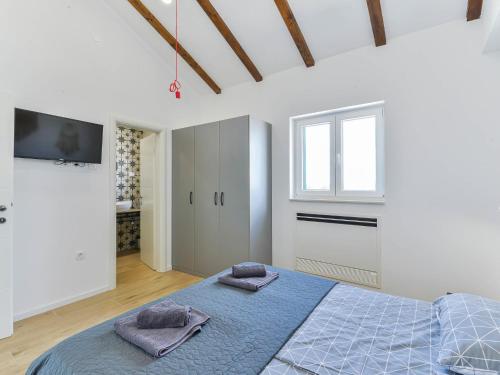 Ένα ή περισσότερα κρεβάτια σε δωμάτιο στο Villa Violet by Interhome