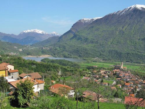 a town in a valley with a lake and mountains at Apartment Stazione by Interhome in Porlezza