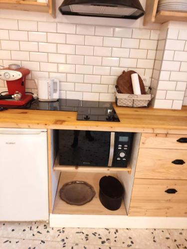 Dapur atau dapur kecil di Charmant appartement dans l’Ancienne Mairie