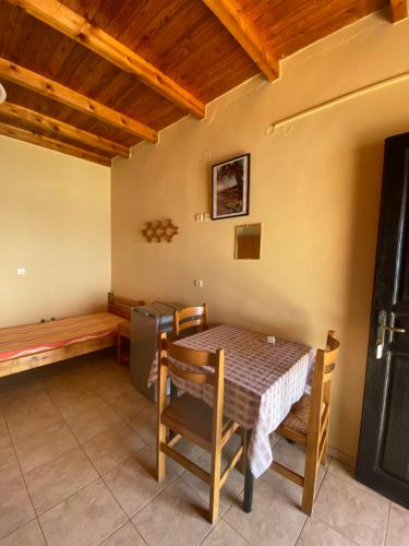 a dining room with a table and chairs at Gavdos Panorama in Gavdos