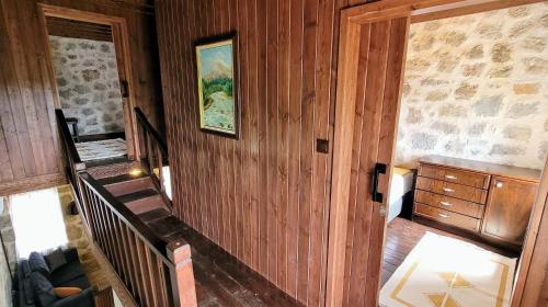 een kamer met een trap en een schilderij aan de muur bij Authentic Bodrum Villa with Special Private Pool in Ortakent