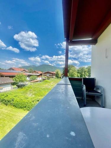 a view from the balcony of a house at Ferienwohnung Lilie - zentral in Bad Wiessee in Bad Wiessee