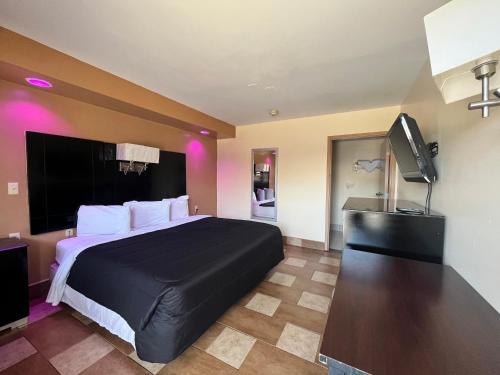Postel nebo postele na pokoji v ubytování Circle Motor Lodge