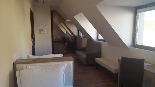 Katil atau katil-katil dalam bilik di Fenicius Charme Hotel