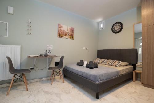 Postel nebo postele na pokoji v ubytování AIOLOS LUXURY alimos quiet apartment 1