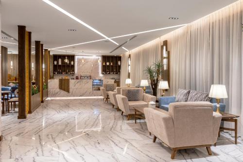 Χώρος καθιστικού στο Seven Gardens Hotel