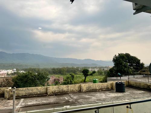 a view from the roof of a building at Daisy by Wabi Sabi Stays with Private balcony in Rishīkesh