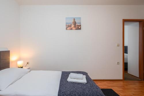 Кровать или кровати в номере Solar Beach Inn