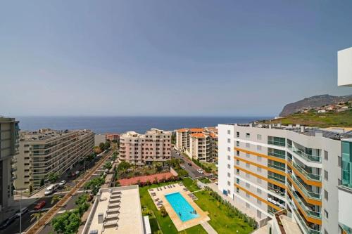 an aerial view of a city with buildings and the ocean at Formosa Ocean View - 142109/AL in Funchal