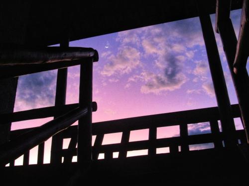 a view of the sky from behind a fence at Pousada Mandalla in Serra do Cipo