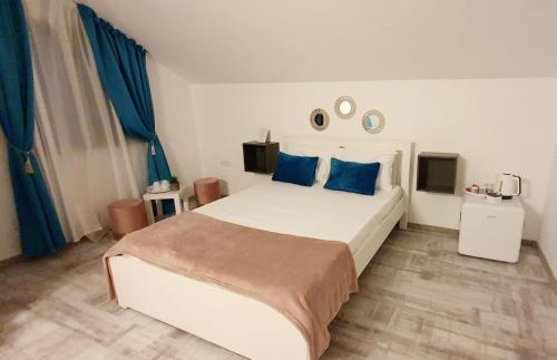 Postel nebo postele na pokoji v ubytování Pepi Residence