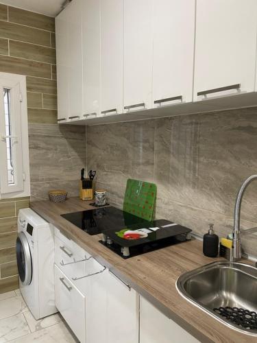 Kuchyň nebo kuchyňský kout v ubytování EVE HOME