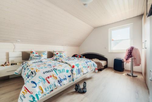 Ένα ή περισσότερα κρεβάτια σε δωμάτιο στο Ferienhaus Arisa III