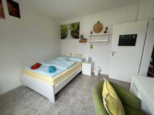 Uma cama ou camas num quarto em maggies-home-hannover