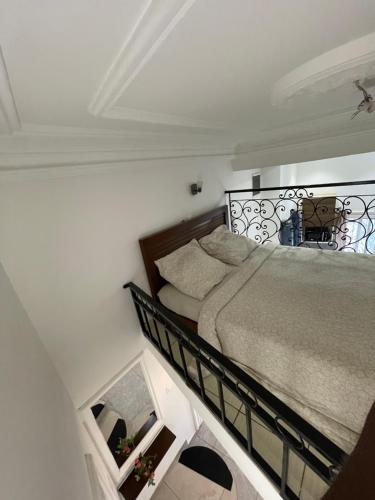 Postel nebo postele na pokoji v ubytování EVE HOME