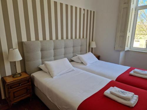 Guest House do Largoにあるベッド