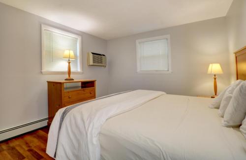 Ένα ή περισσότερα κρεβάτια σε δωμάτιο στο Hamilton Village Inn