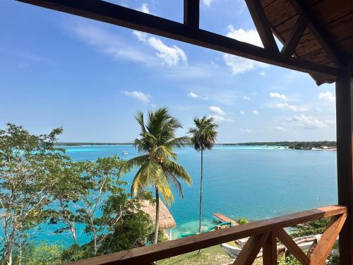 a view of the ocean from a cabin at bacalar My Love Front Laguna in Bacalar