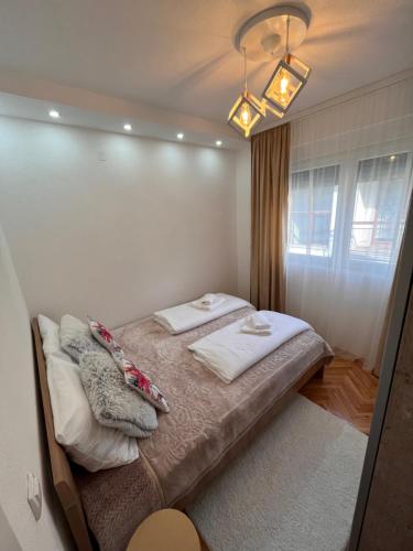 Postel nebo postele na pokoji v ubytování Apartman Polo
