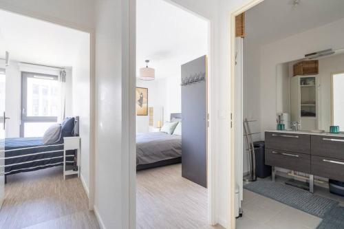 Ένα ή περισσότερα κρεβάτια σε δωμάτιο στο Cocon Villanueva