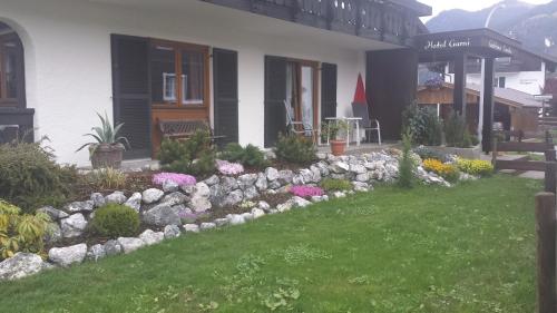 Сад в Gästehaus Carola
