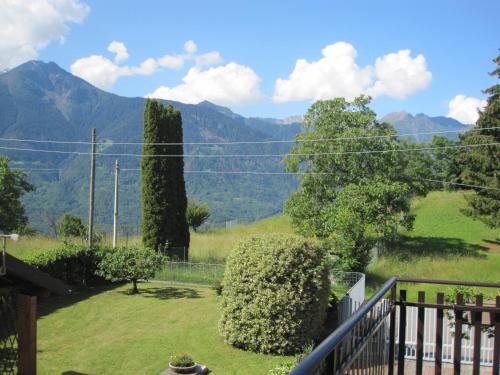 a view of the mountains from the balcony of a house at Casa vacanze Fregè in Castione Andevenno