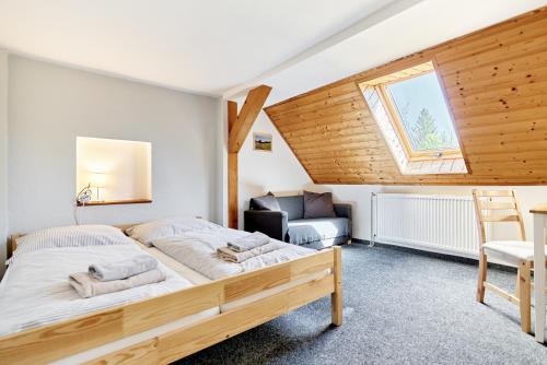 Postel nebo postele na pokoji v ubytování Pension Barborka